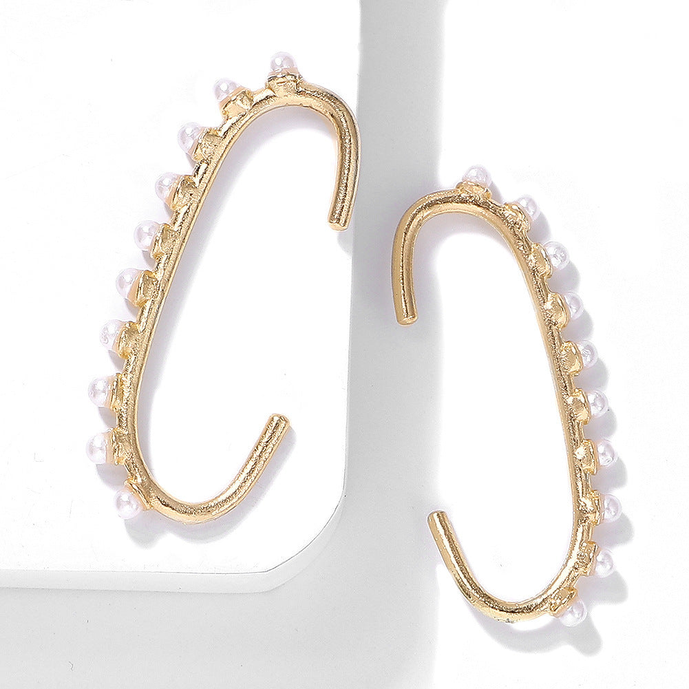 Pearl C-shaped earrings-Jewearrings