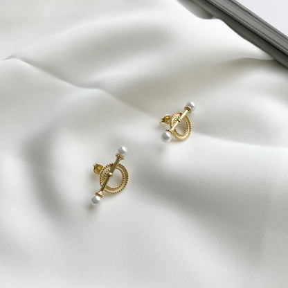 Pearl earrings with silver design-Jewearrings