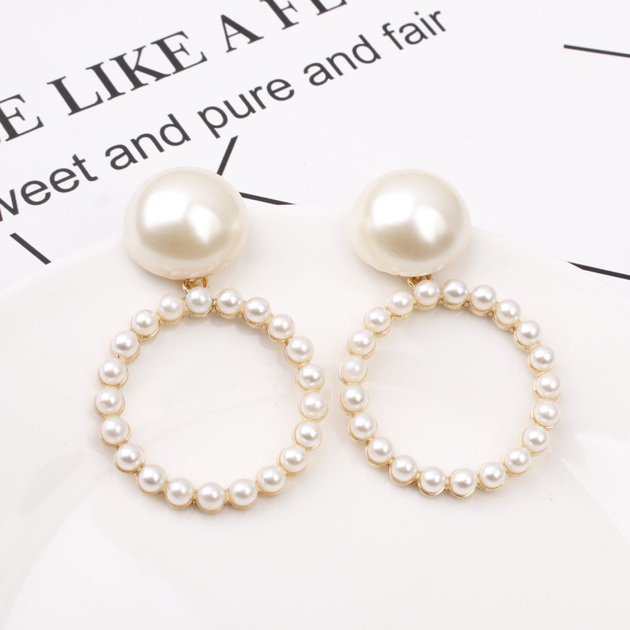 Pearl circle earrings-Jewearrings