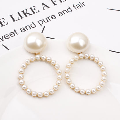 Pearl circle earrings-Jewearrings