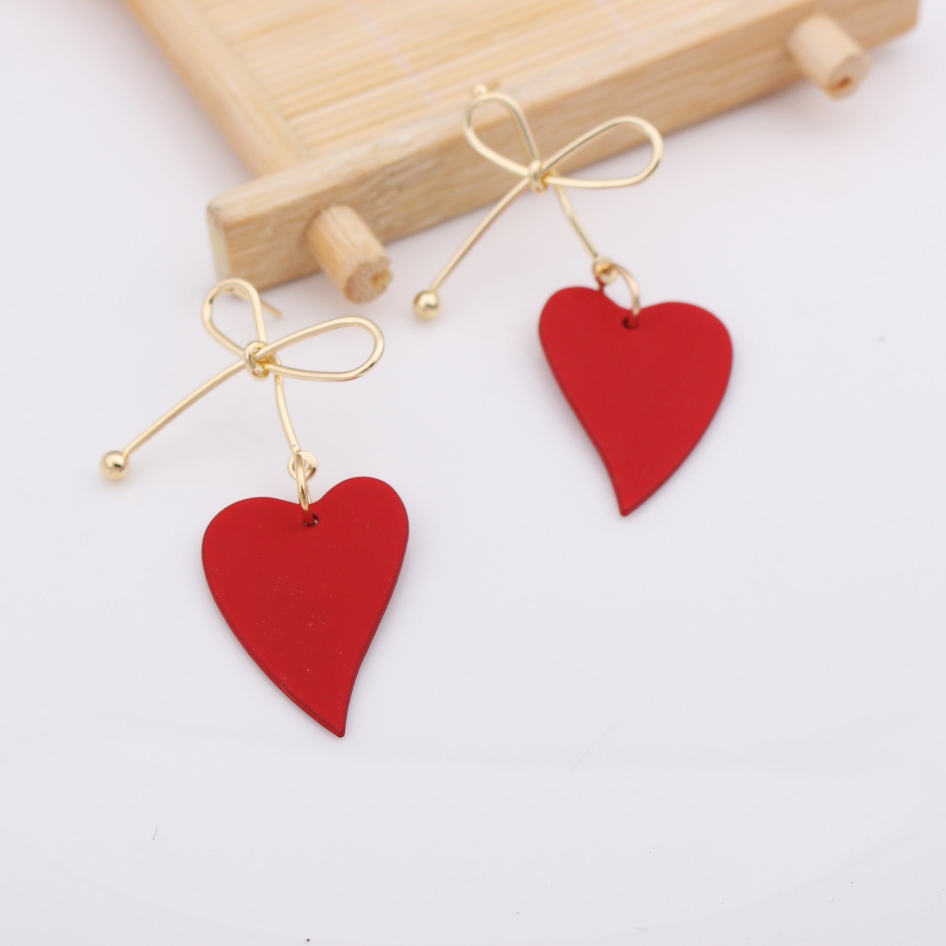 Japanese and Korean fashion temperament simple pearl bow earrings exquisite cute girl heart sweet beauty Super Fairy earrings-Jewearrings