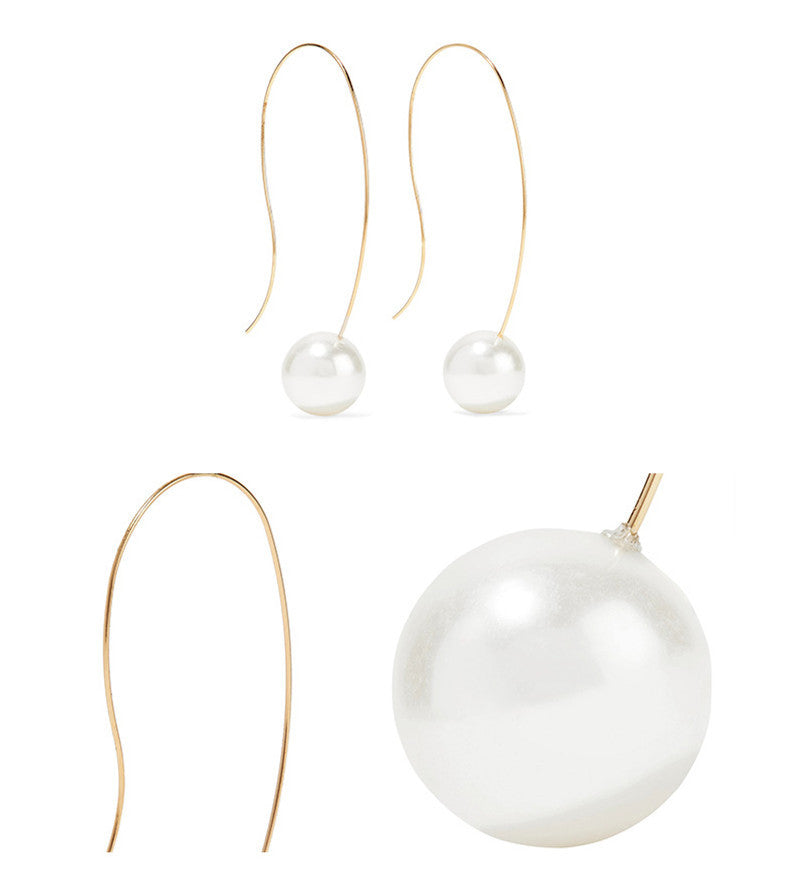 Pair of curved Pearl Earrings-Jewearrings