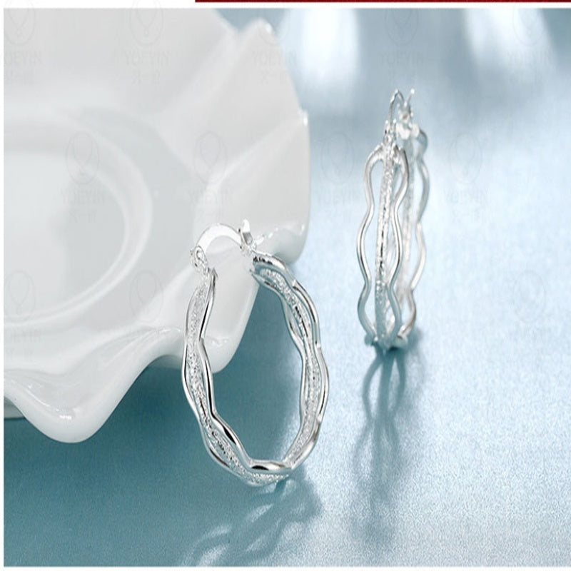 Ripple hoop earrings-Jewearrings