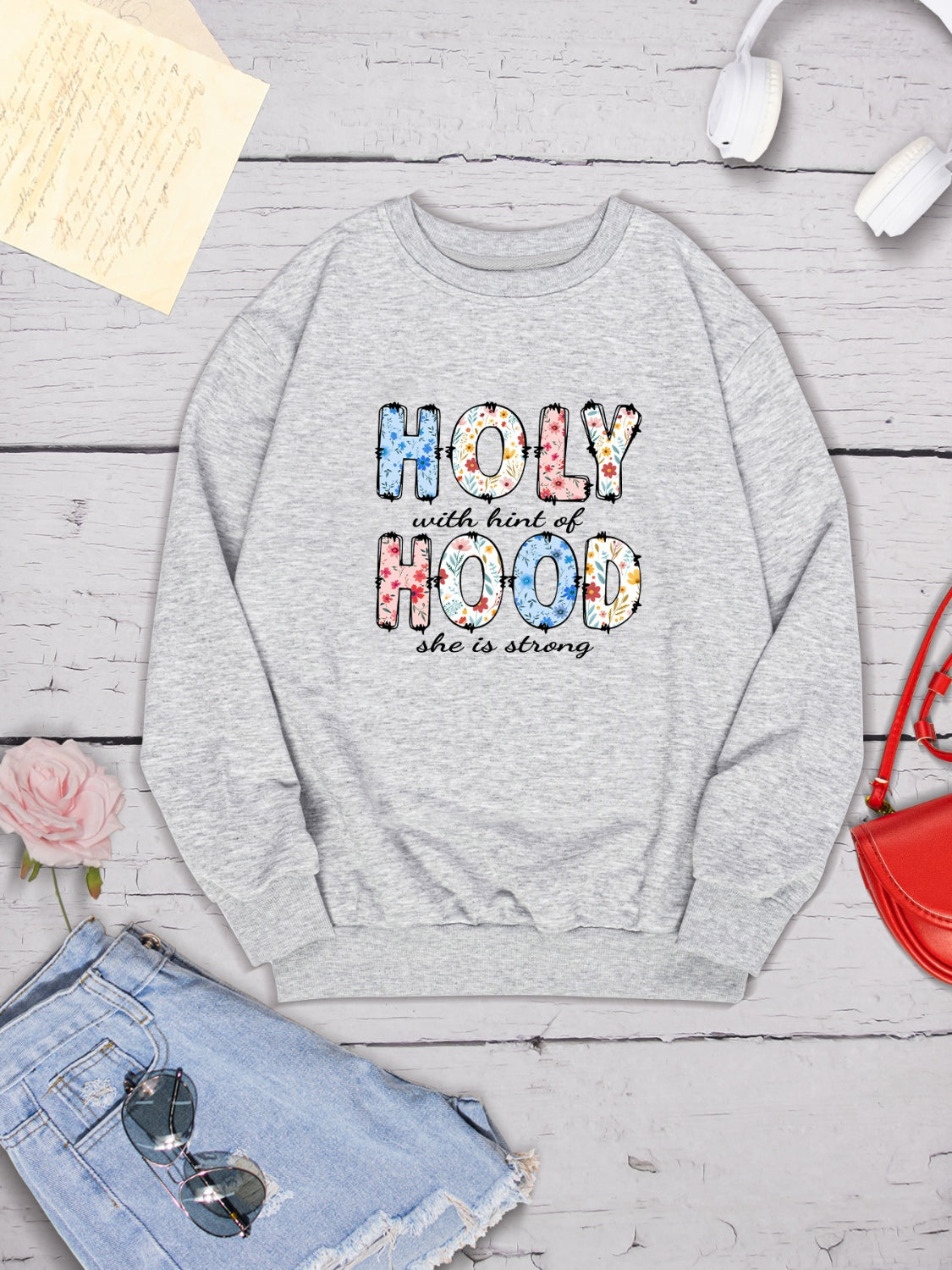 HOLY WITH HINT OF HOOD SHE IS STRONG Round Neck Sweatshirt-Jewearrings