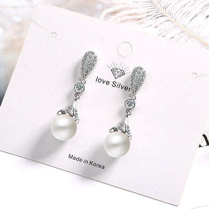 Long pearl earrings-Jewearrings