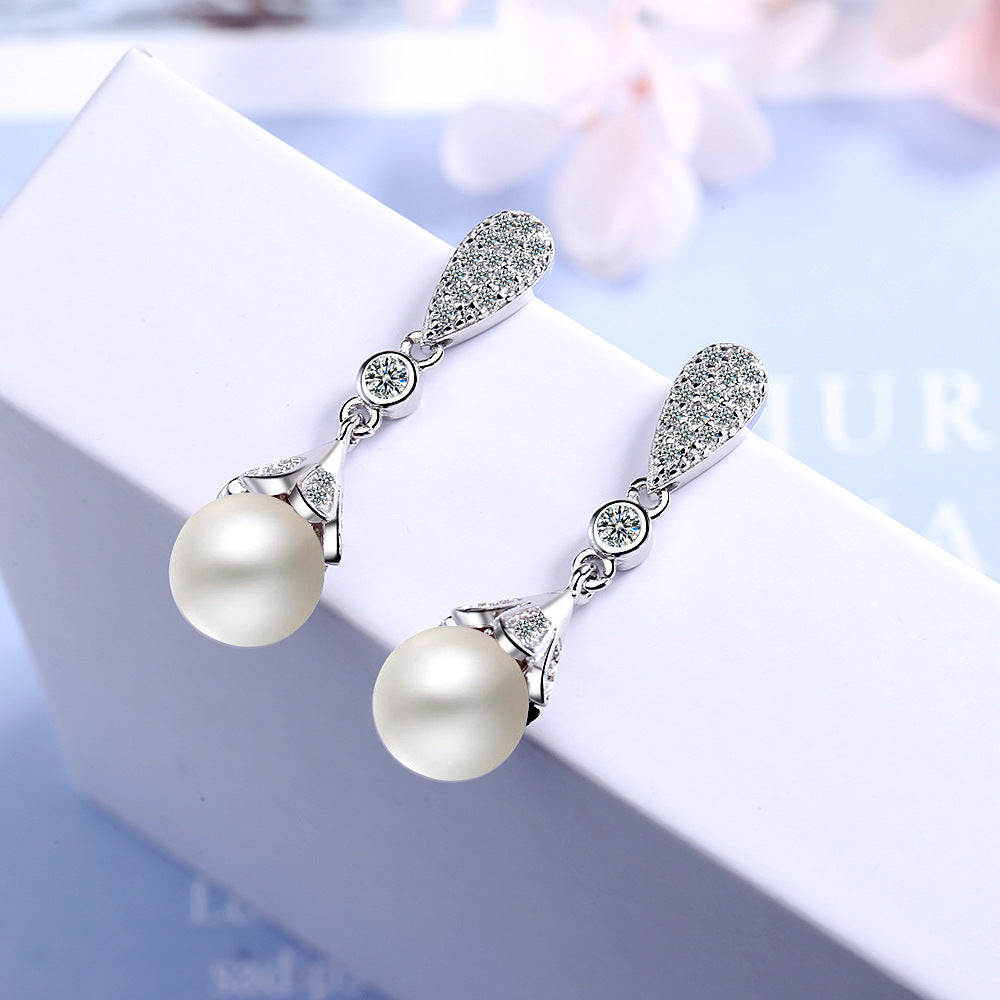 Long pearl earrings-Jewearrings