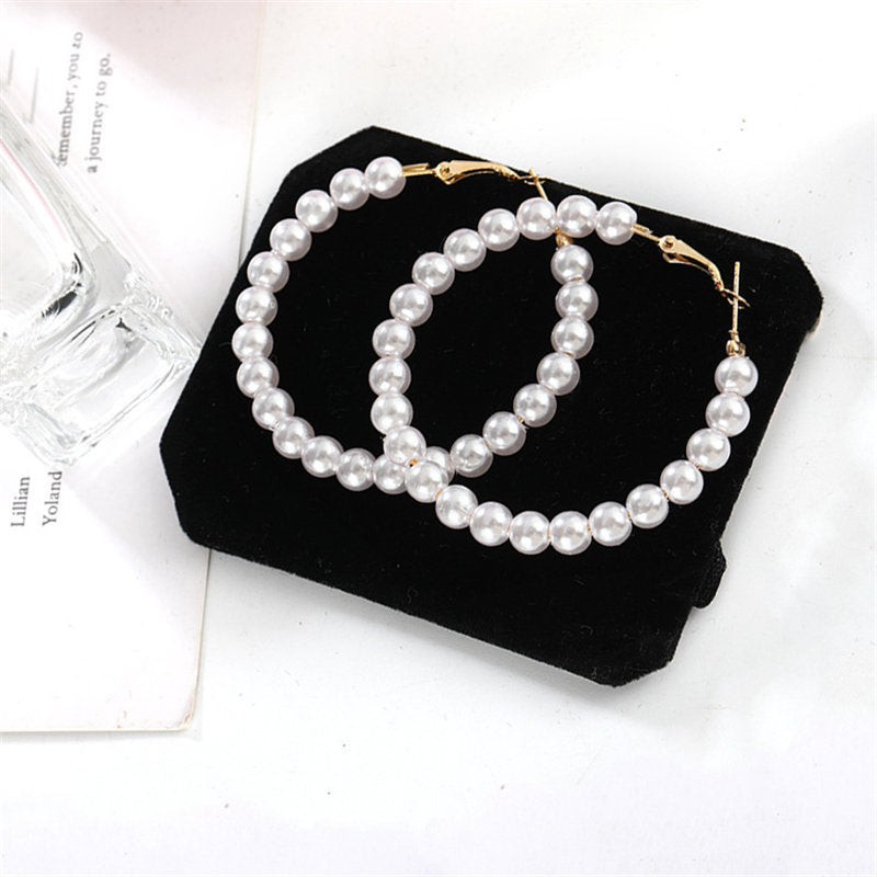 Pearl circle earrings-Jewearrings