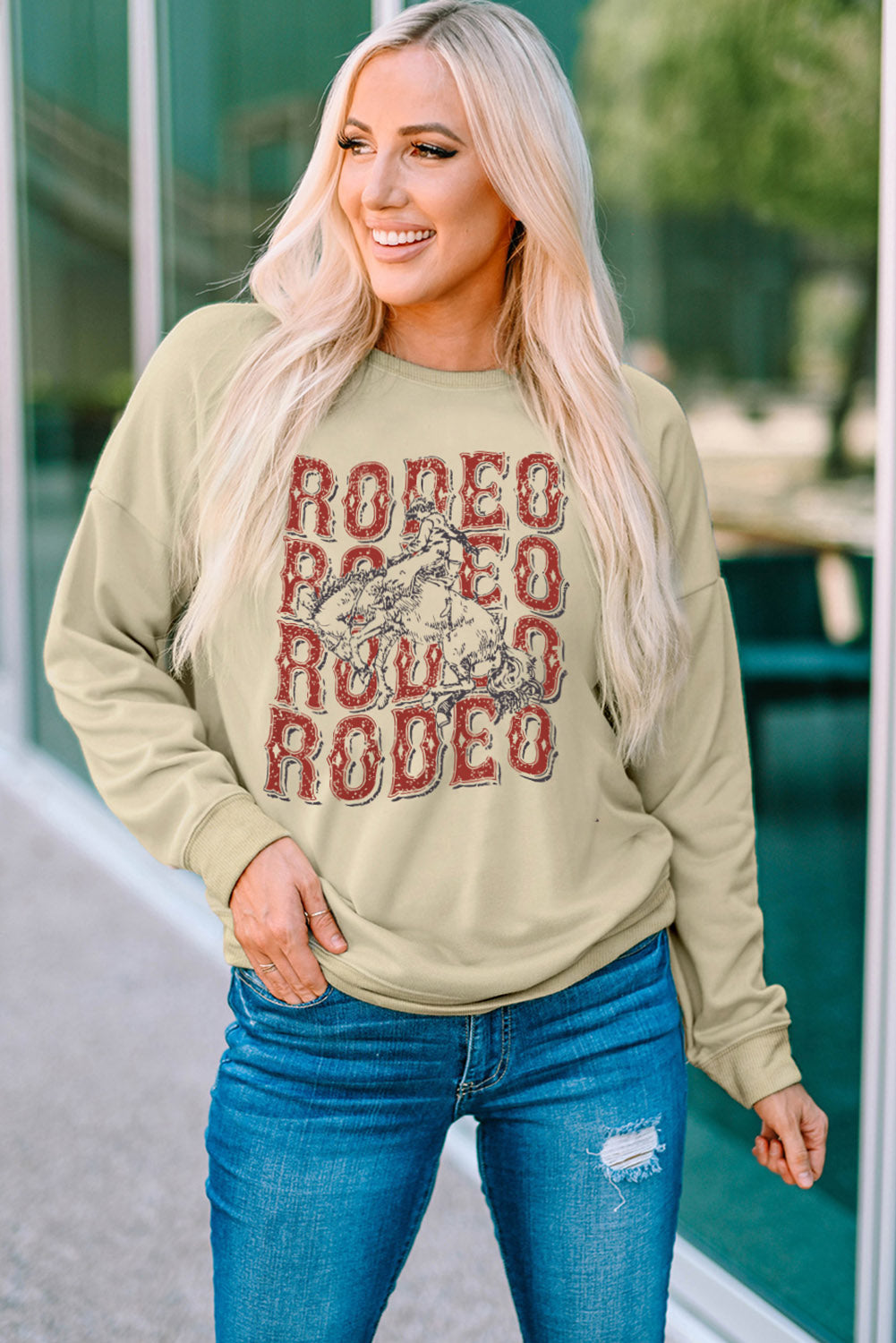 Round Neck Dropped Shoulder RODEO Graphic Sweatshirt-Jewearrings