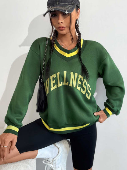 WELLNESS Graphic V-Neck Sweatshirt-Jewearrings