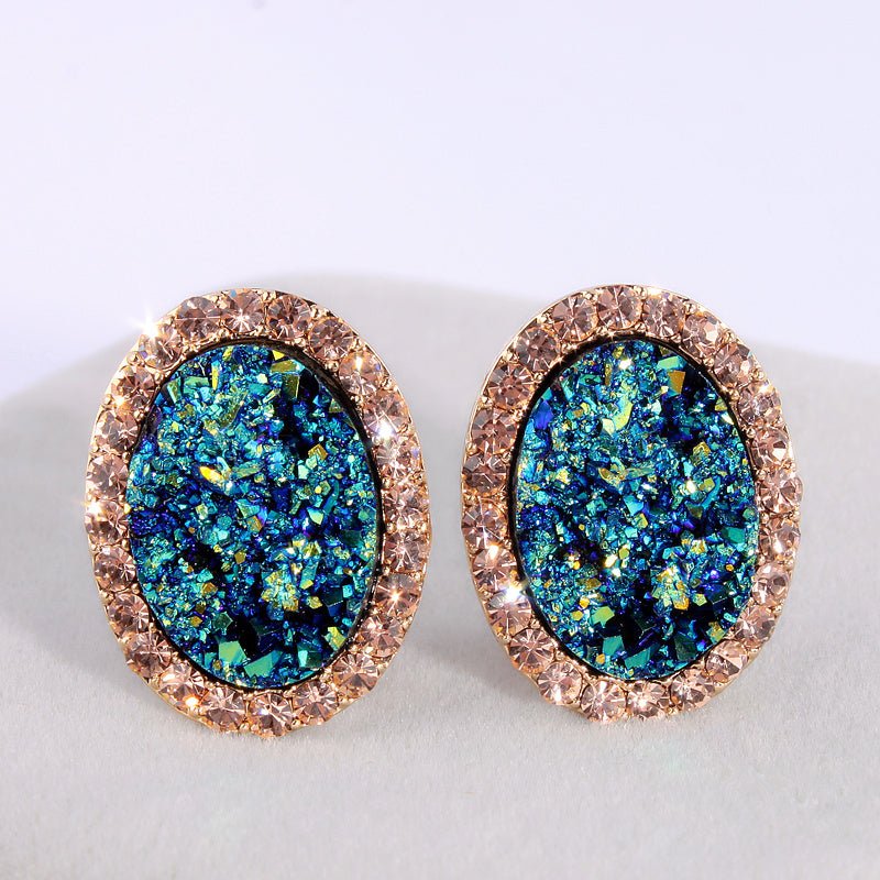 Blue oval diamond color-changing earrings-Jewearrings