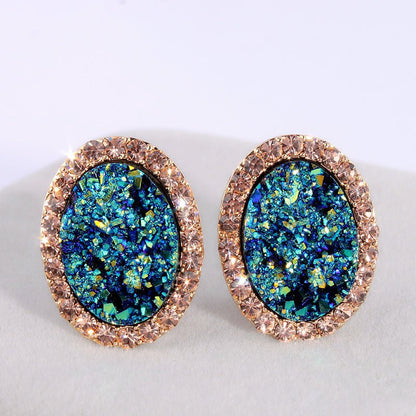 Blue oval diamond color-changing earrings-Jewearrings