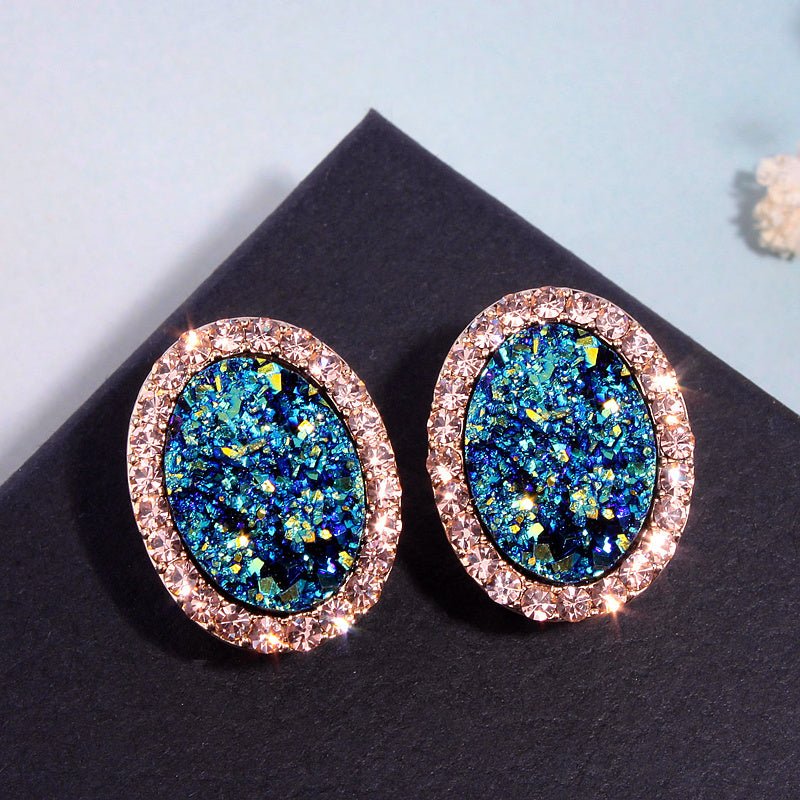 Blue oval diamond color-changing earrings-Jewearrings