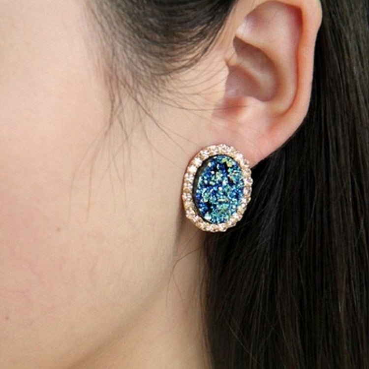 Blue oval diamond color-changing earrings-Jewearrings