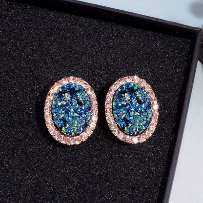 Blue oval diamond color-changing earrings-Jewearrings