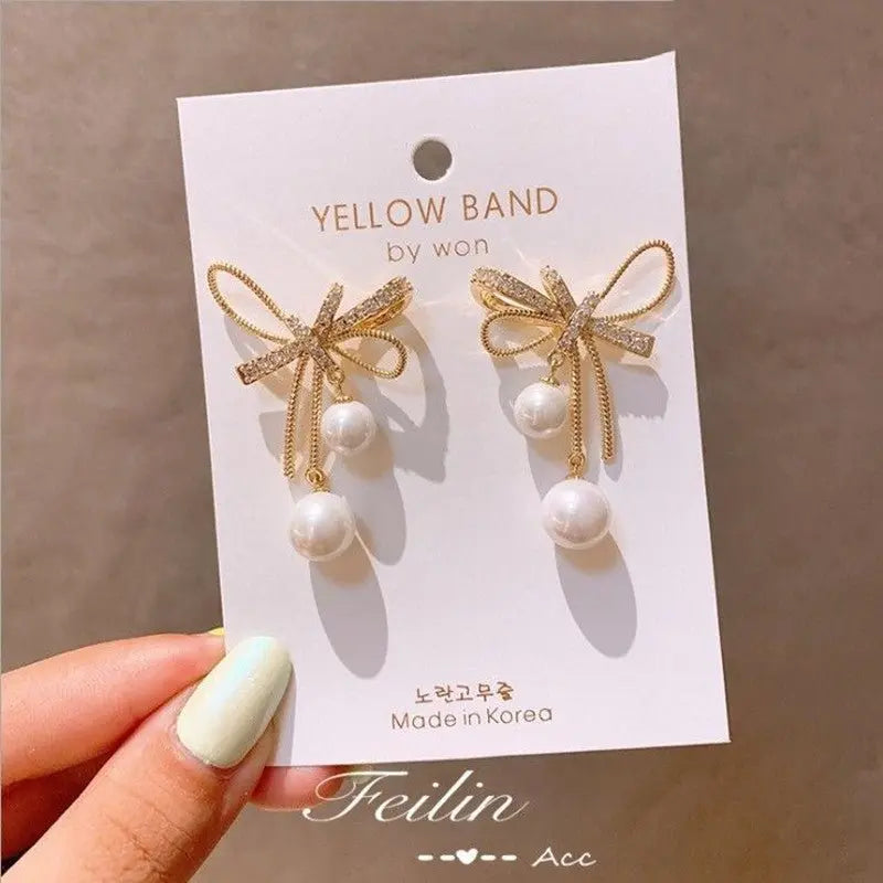 Dainty Pearl Bow Earrings-Jewearrings