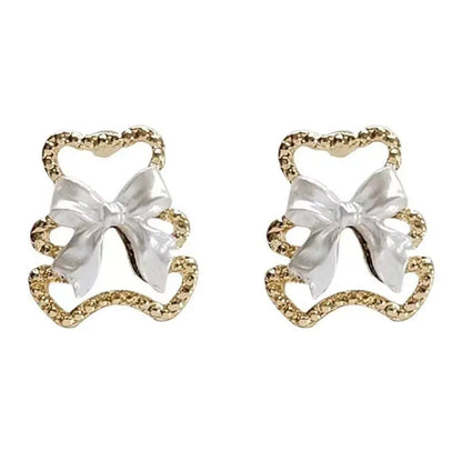 Delicate Pearl Bow Earrings - Sterling Silver Studs or Clips-Jewearrings