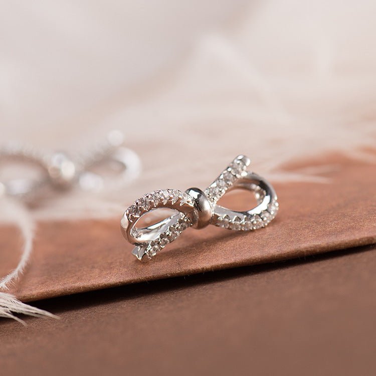 Diamond bow earrings-Jewearrings