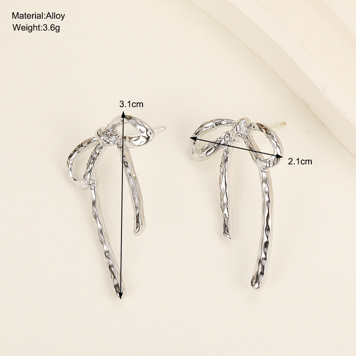 Women's Retro Irregular Metal Bow Earrings-Jewearrings