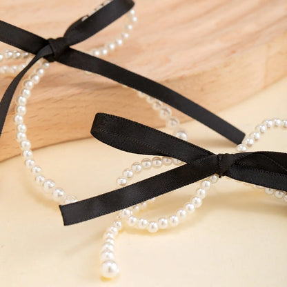 Elegant Pearl Bow Earrings-Jewearrings