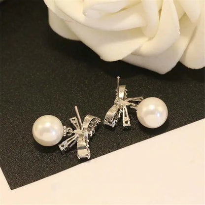 Elegant Pearl Bow Earrings - Sterling Silver-Jewearrings