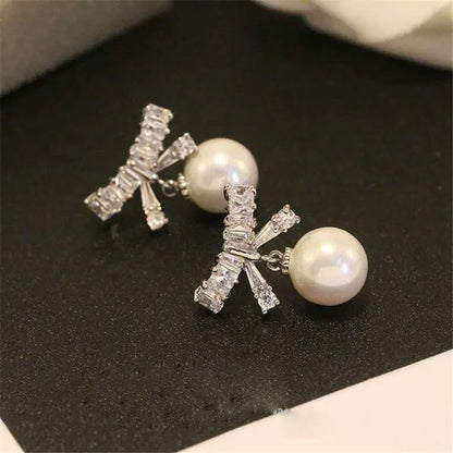 Elegant Pearl Bow Earrings - Sterling Silver-Jewearrings