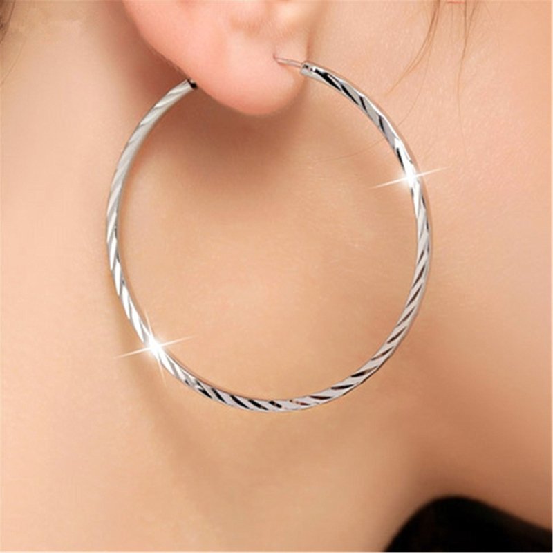 Exaggerated big ear hoop earrings with silver ornaments-Jewearrings