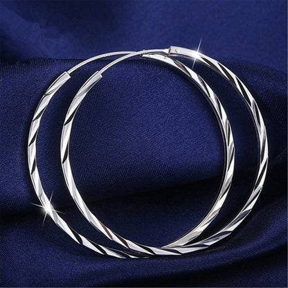 Exaggerated big ear hoop earrings with silver ornaments-Jewearrings