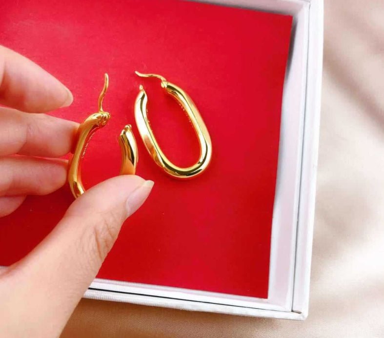 Exaggerated gold U-shaped earrings-Jewearrings