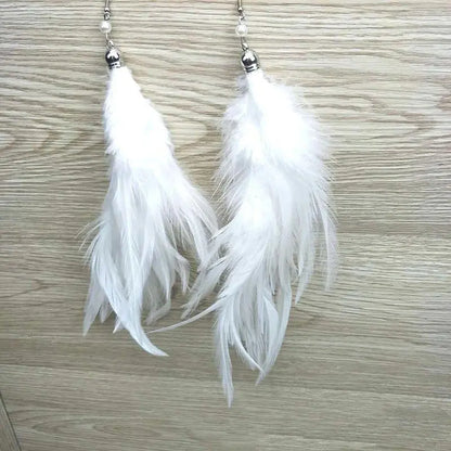 Feather Earrings: White Heart-Shaped-Jewearrings