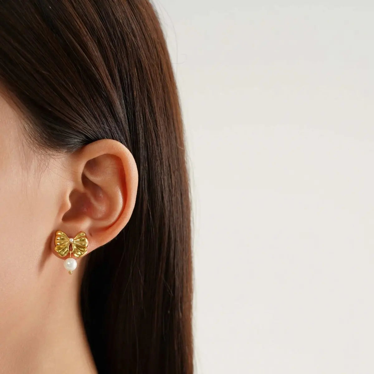 Gold Bow Earrings | Classic & Elegant Pearl Design-Jewearrings