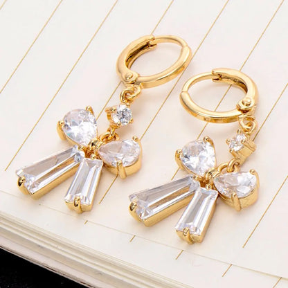 Gold Bow Earrings | Classic & Elegant Zirconia Studs-Jewearrings