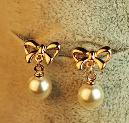 Gold Bow Earrings with Hearts & Zircons-Jewearrings