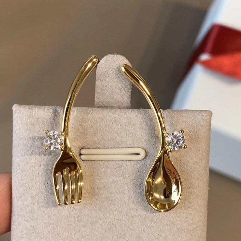 Golden cutlery and diamond earrings-Jewearrings