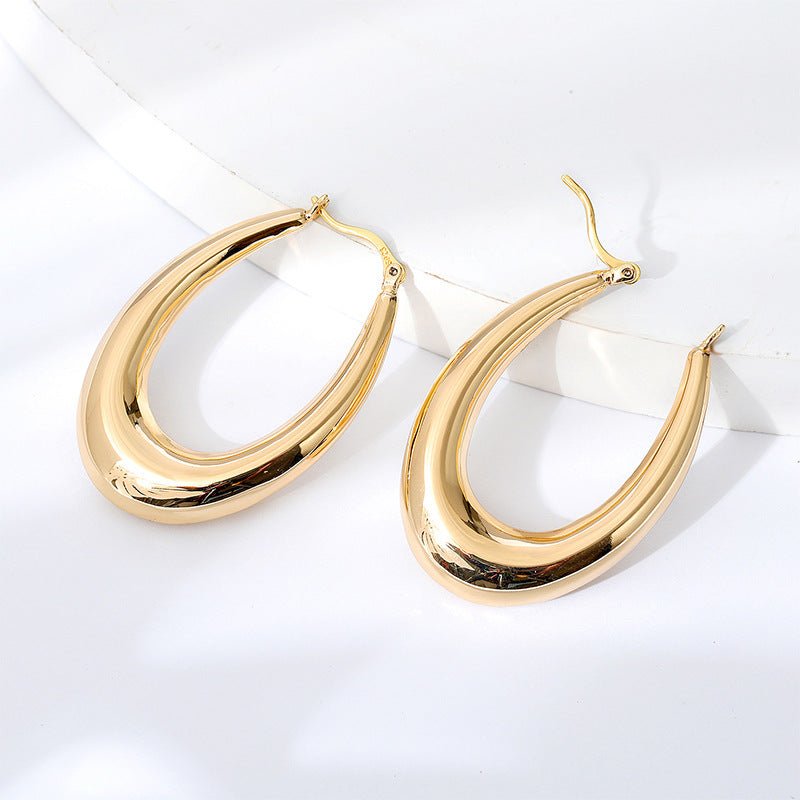 Golden geometric round big earrings-Jewearrings