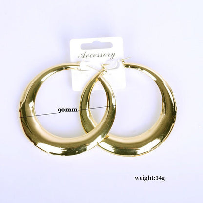 Golden geometric round big earrings-Jewearrings