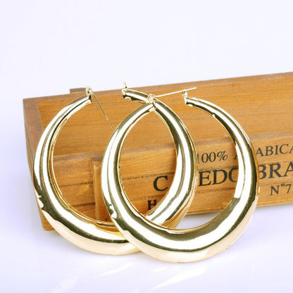 Golden geometric round big earrings-Jewearrings