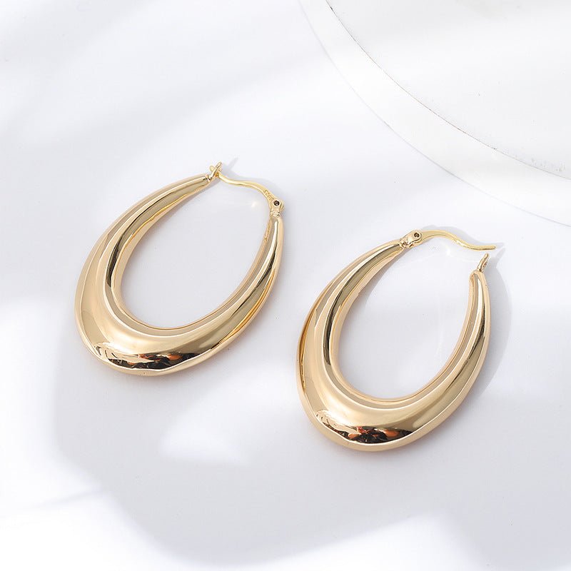 Golden geometric round big earrings-Jewearrings