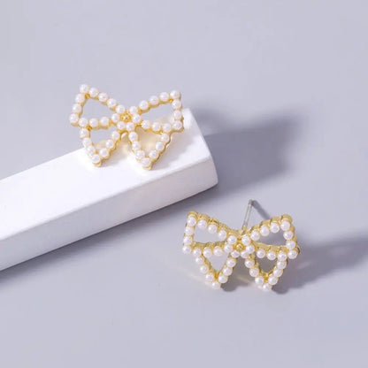 Golden Pearl Bow Earrings | Add Elegance to Any Outfit-Jewearrings