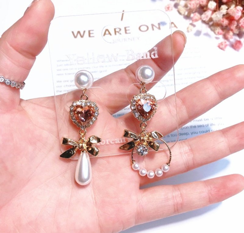 Metal bow with diamond heart love orange gemstone pearl tassel earrings-Jewearrings