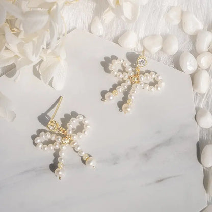 Pearl Bow Earrings: Chic & Elegant-Jewearrings