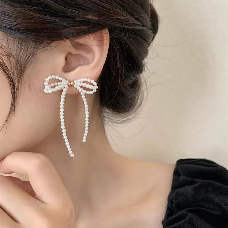 Pearl Bow Earrings - Elegant & Playful Earrings-Jewearrings