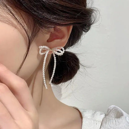 Pearl Bow Earrings - Elegant & Playful Earrings-Jewearrings