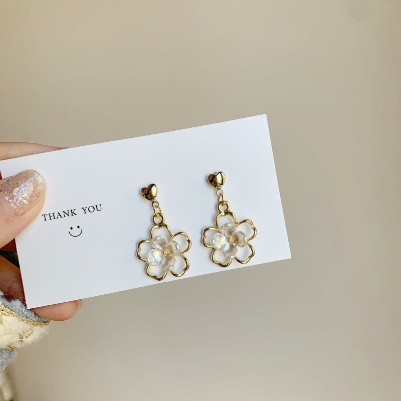 S925 Silver Needle French Symphony Hollow Shell Flower Earrings Fresh Petal Earrings-Jewearrings