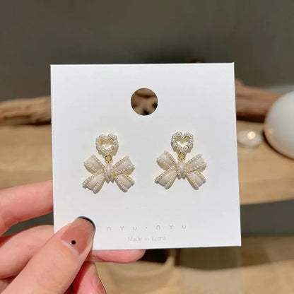 Silver Pearl Bow Earrings | Cute & Elegant-Jewearrings