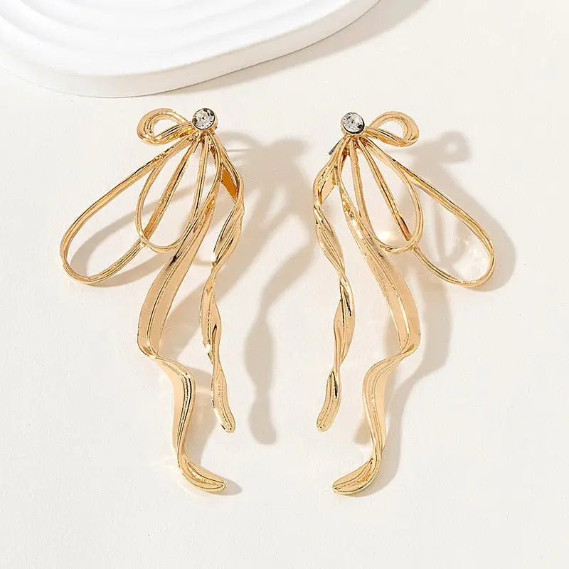 Stand Out From The Crowd: Gold Bow Earrings For Women-Jewearrings