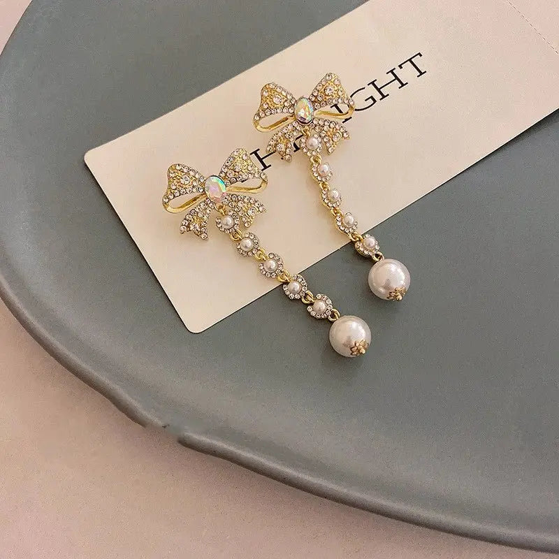 Stunning Pearl Bow Earrings with Tassels-Jewearrings