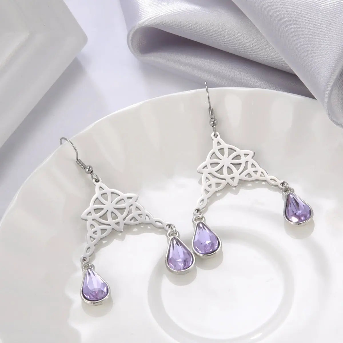 Titanium Earrings Hollow Double Knot-Jewearrings