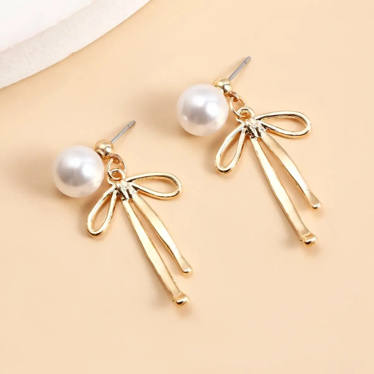 Upgrade Your Look: Retro French Pearl Bow Earrings-Jewearrings